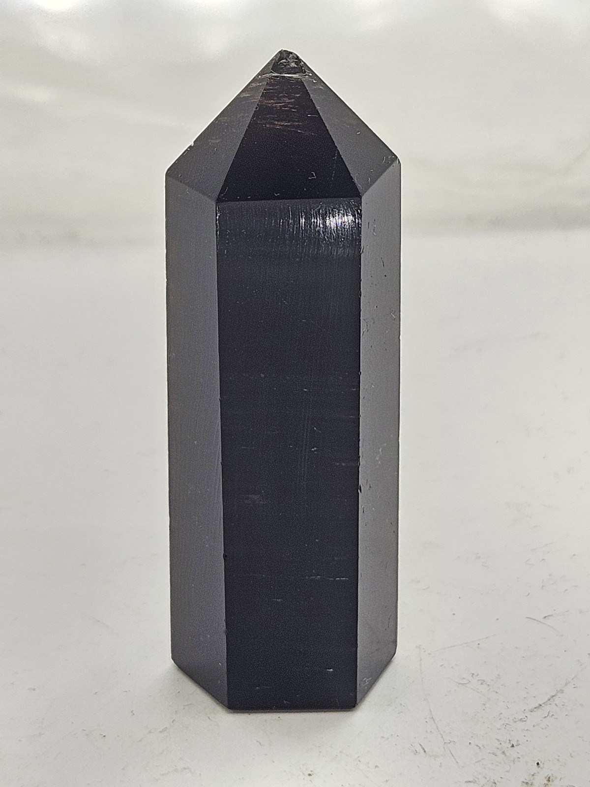 Genuine Polished Obsidian Tower – Sleek Black Reflective Crystal Point