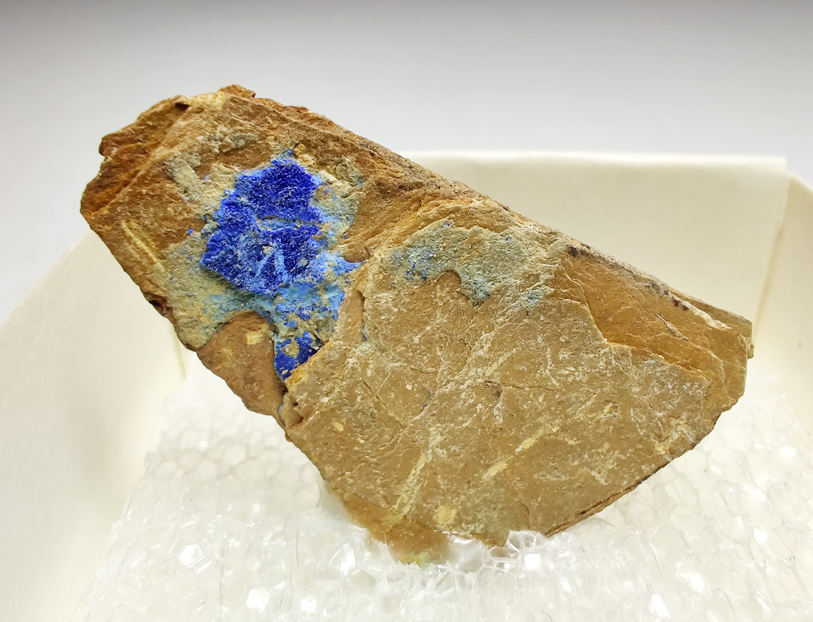 Azurite on matrix, Thumbnail specimen. From Mexico. 3.5 cm.