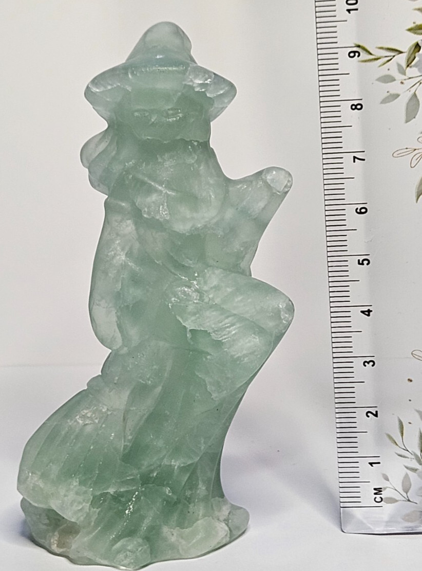 Green fluorite witch on a broom – 9.5cm/ 150g approx – absorbs negative energy