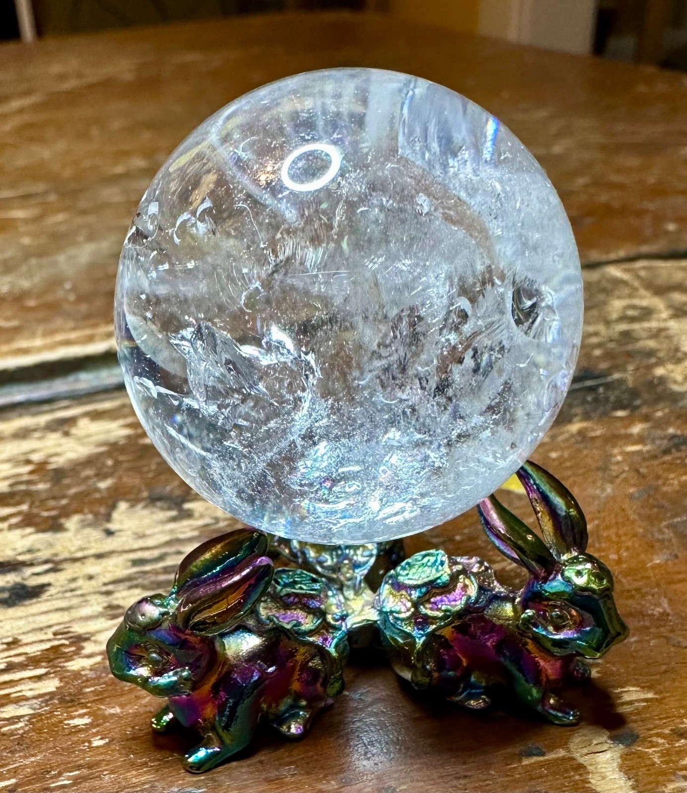 Clear quartz crystal sphere many rainbows with metal bunny stand Free shipping