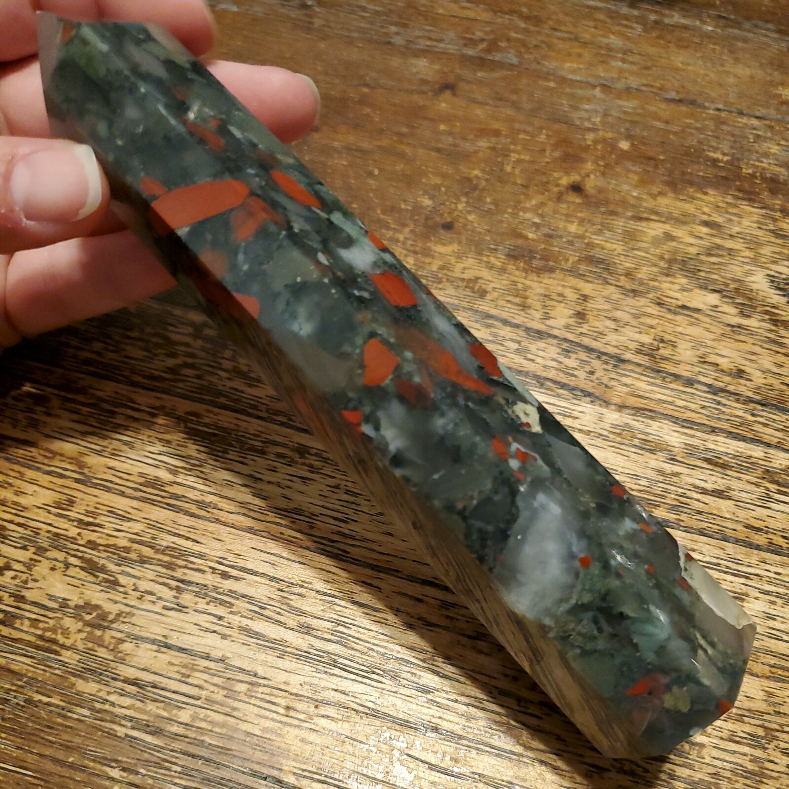 African Bloodstone Crystal Tower Point. Approx 6.75in x 1.46in x 1.11in, 304g