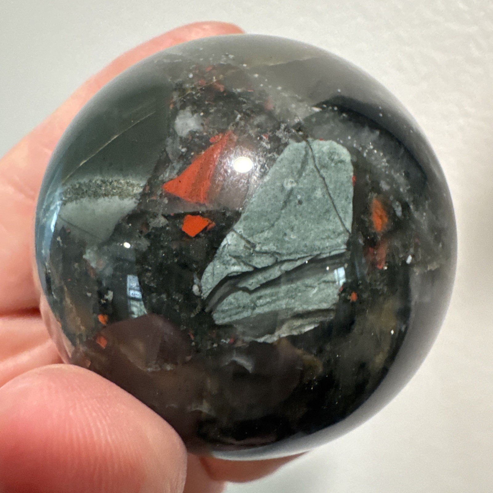 African Bloodstone Crystal Sphere 241 Grams 55 mm