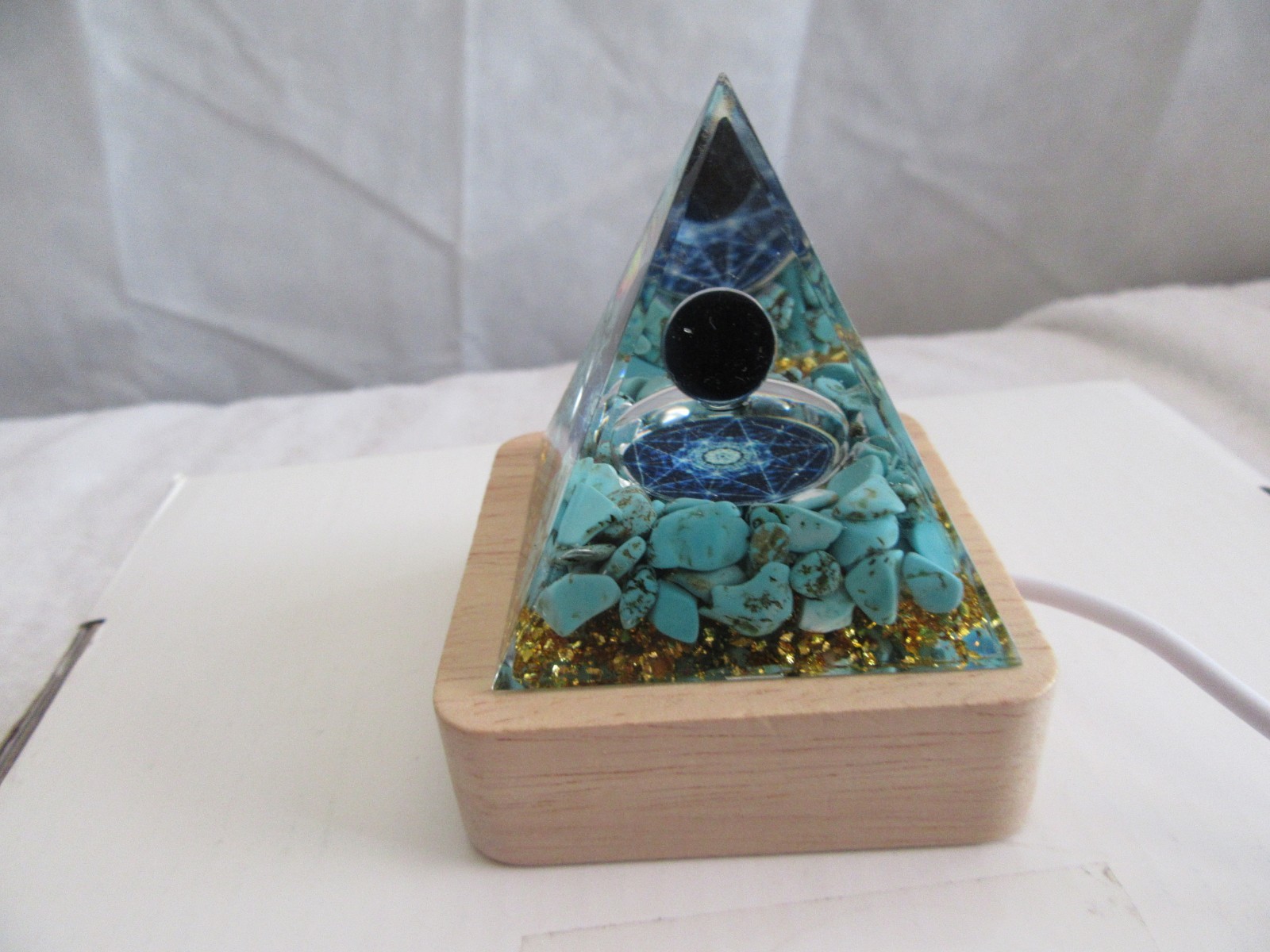 Orgone Pyramid turquoise blue gold Pyramid with multi-color lighted wood base