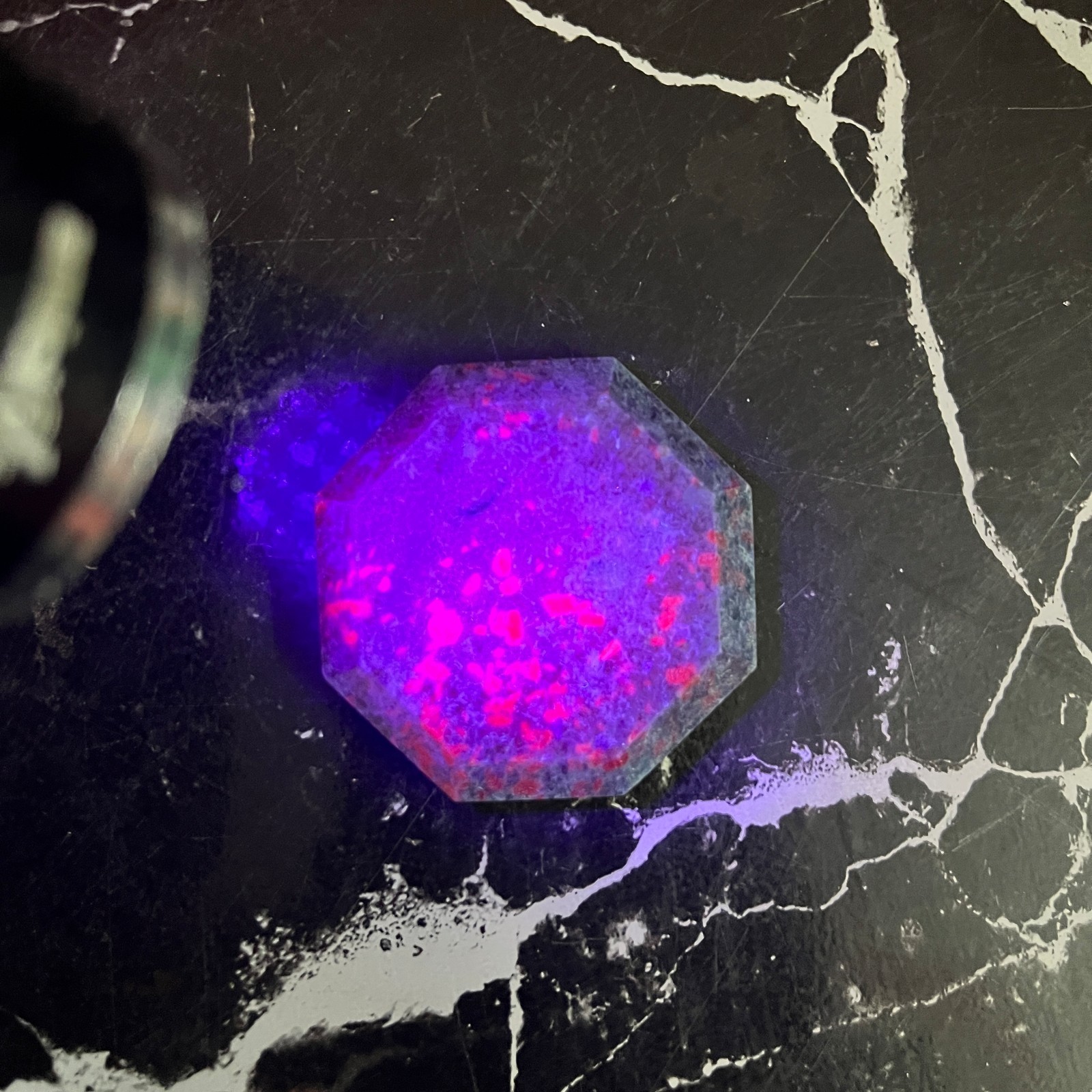 Ruby Kyanite Palm Stone UV Reactive Fluorescent Crystal Octagon 48mm