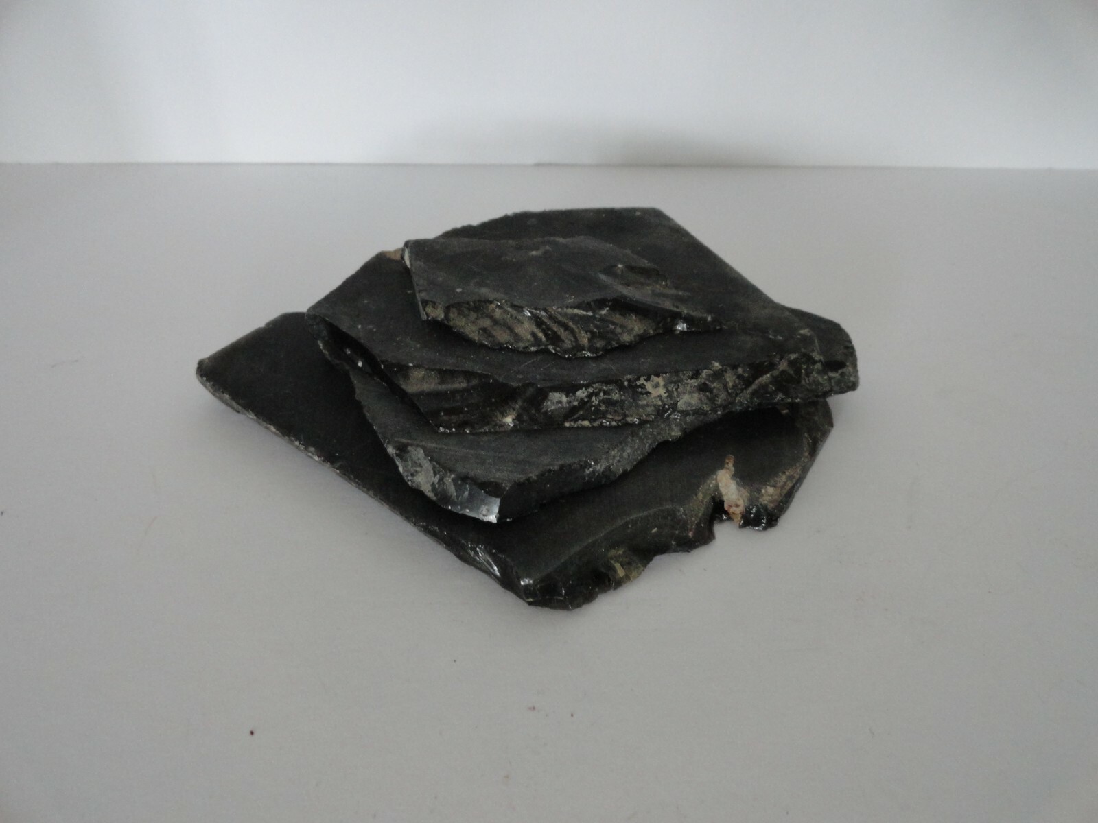 Lot of 4 pieces Sliced Natural Black Stone or Geode – 10 ounces 1/4″ thick