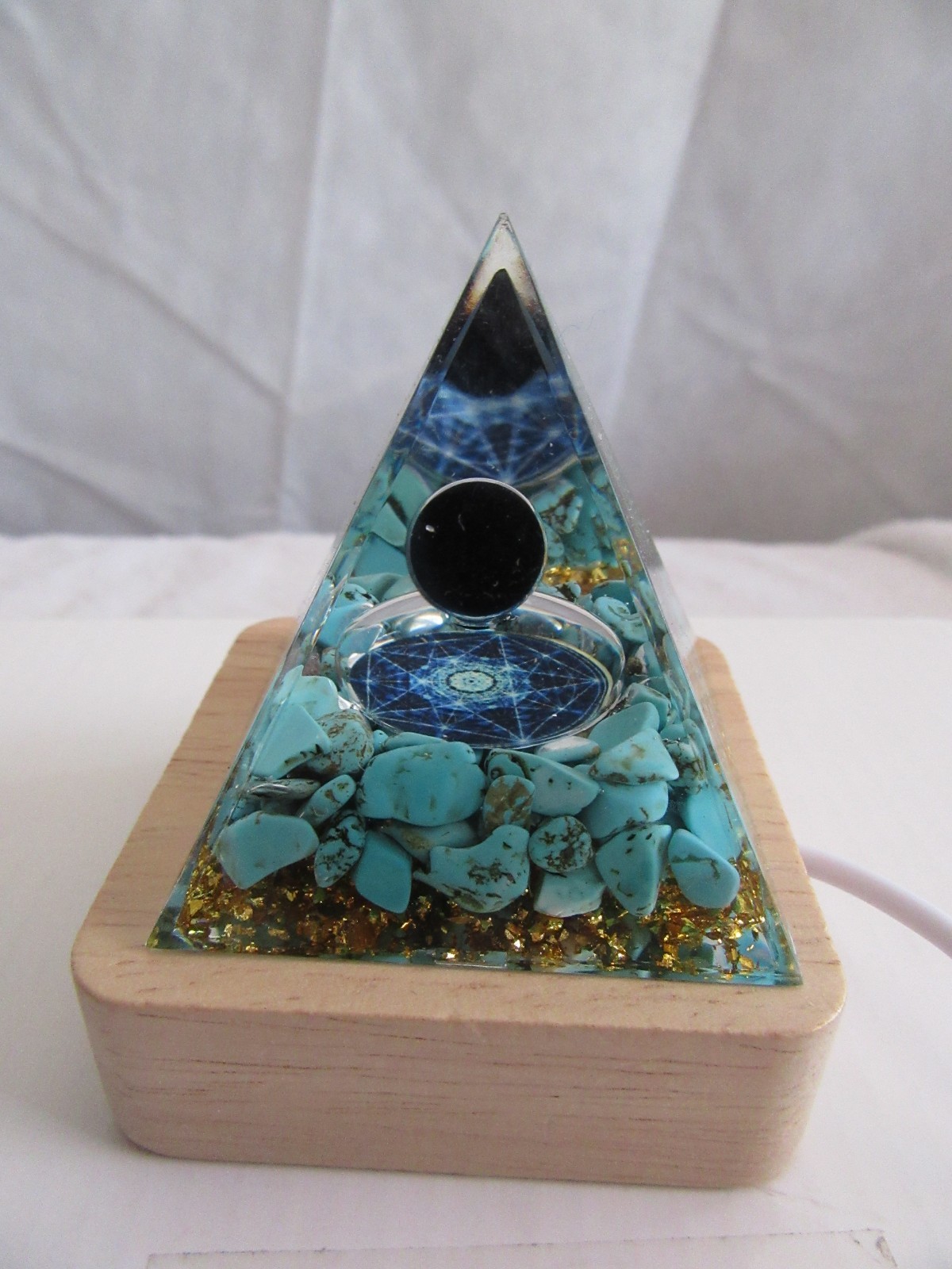 Orgone Pyramid turquoise blue gold Pyramid with multi-color lighted wood base