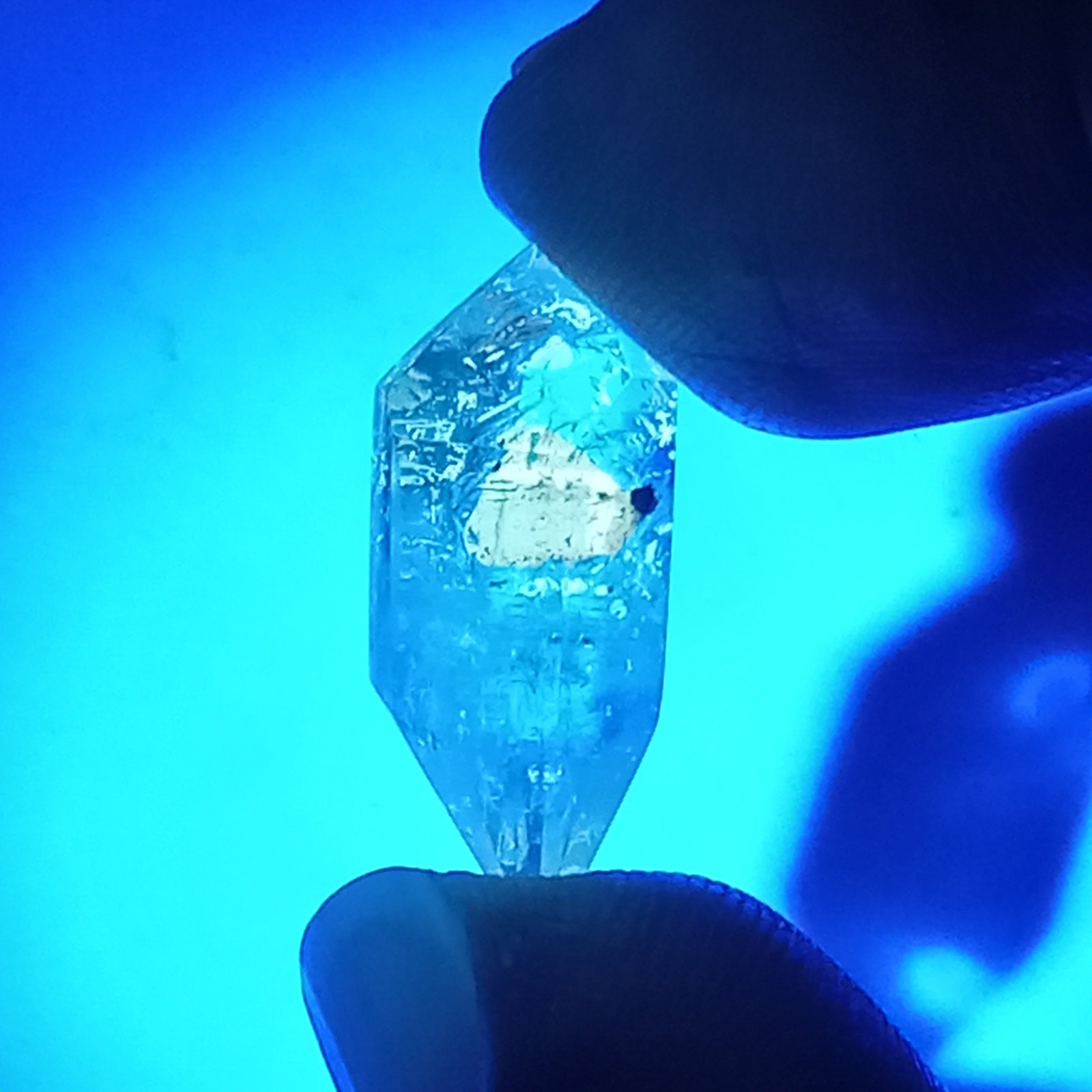 Double Terminated Oil Bubble Enhydro Quartz with UV Reactive Inclusion