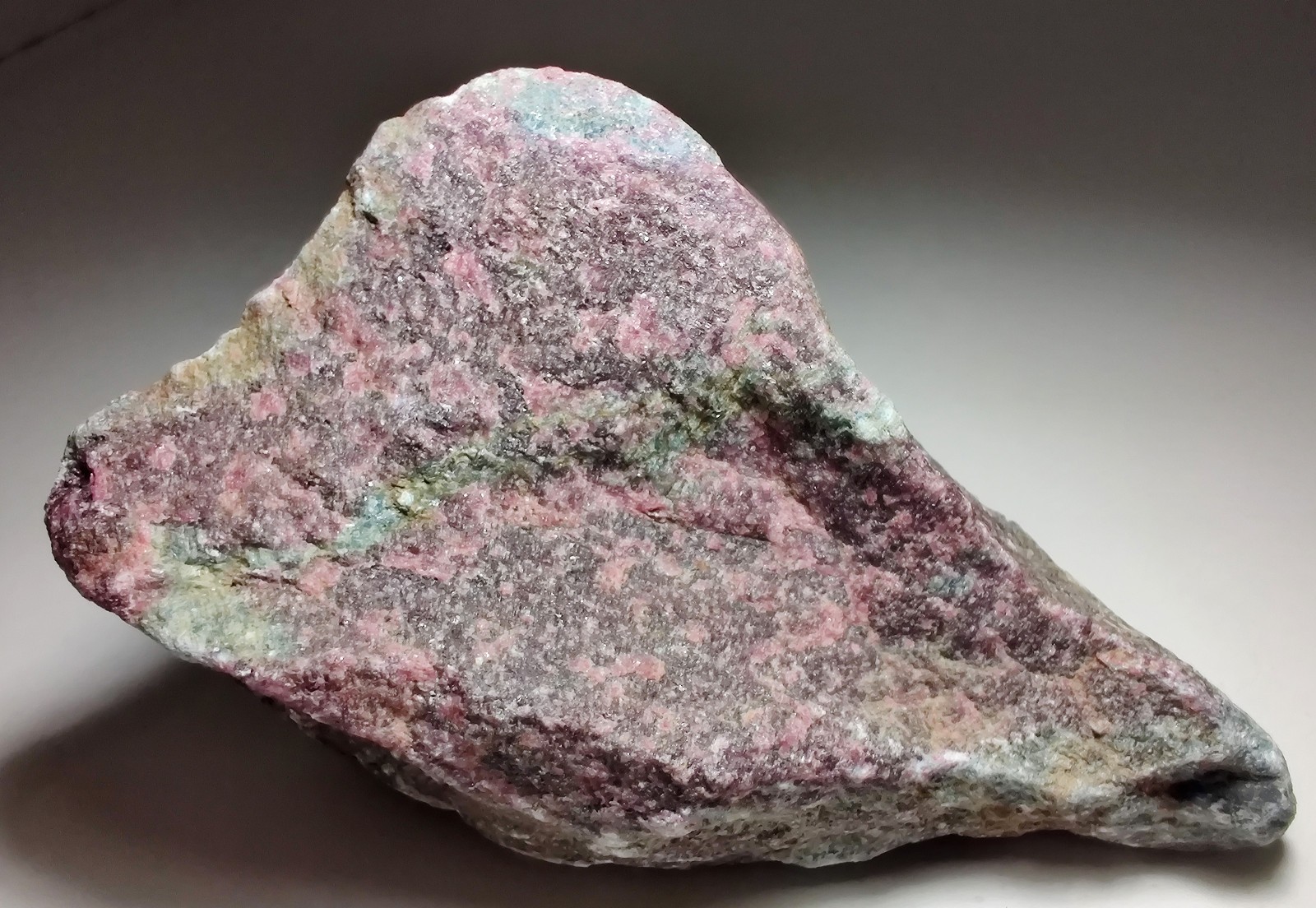 Ruby with large Kyanite crystals, UV. Mysore, Kamataka, India. 720 grams.