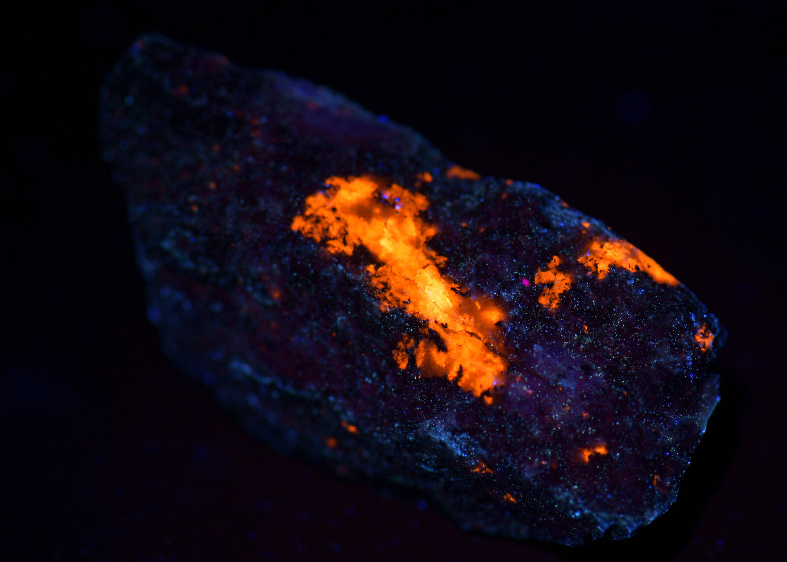 Sodalite in matrix, fluorescent. Mt. St. Hilaire, Canada. 16 grams.