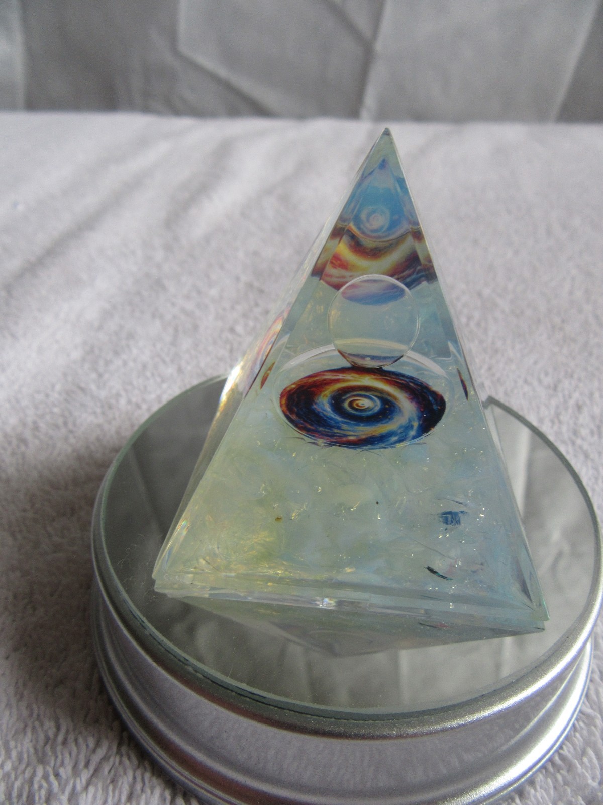 Orgone Pyramid (2) white w/color & 1 B&W yin/yang Dragon 1 color lighted base.