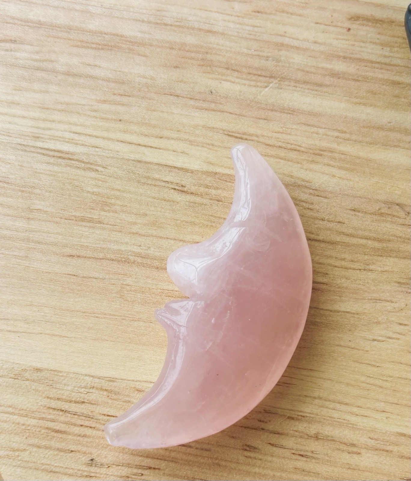 Hand-carved Rose Quartz Crescent moon face crystal