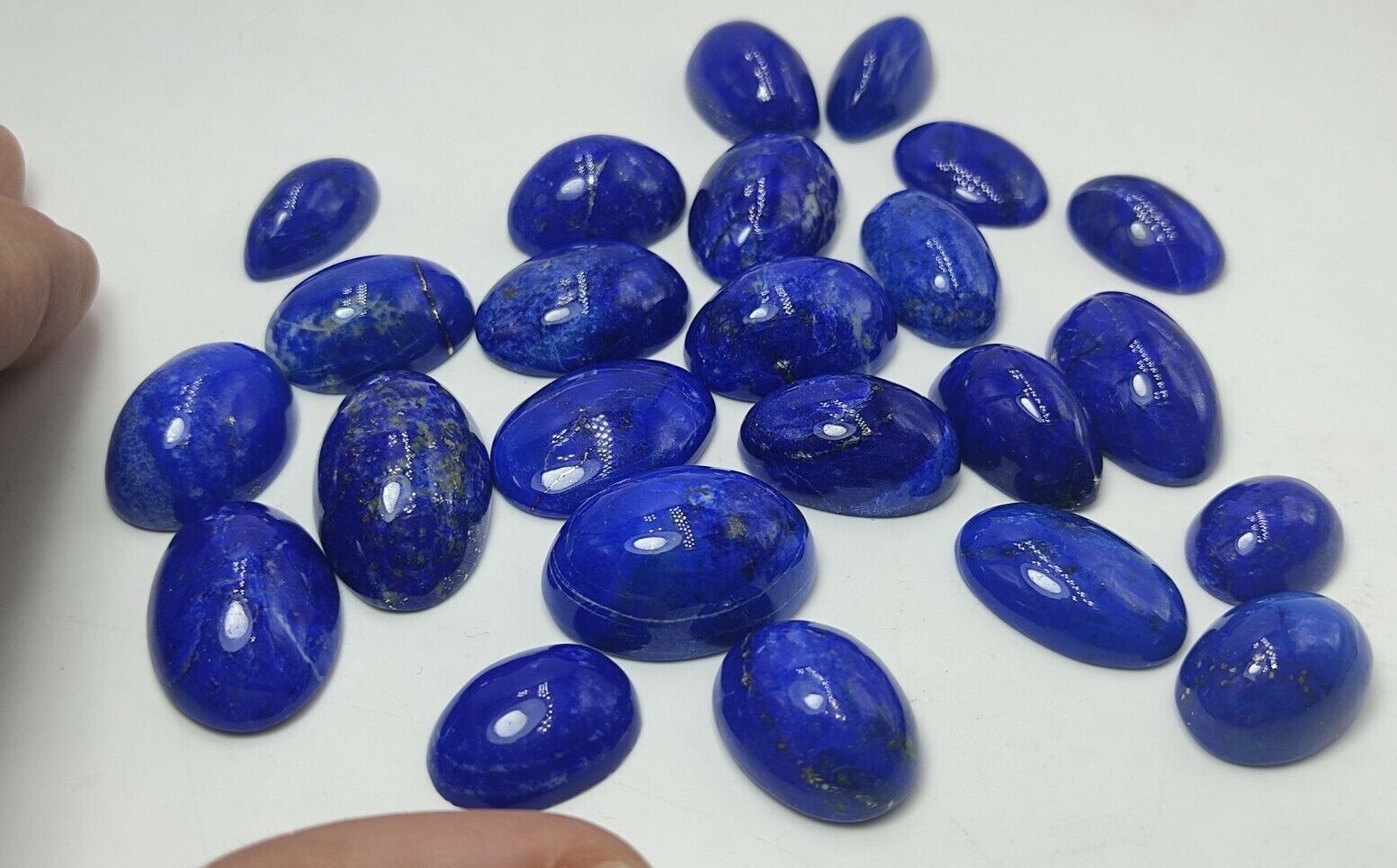Top quality Lapis Lazuli cabochons, 24 pieces, 105grams