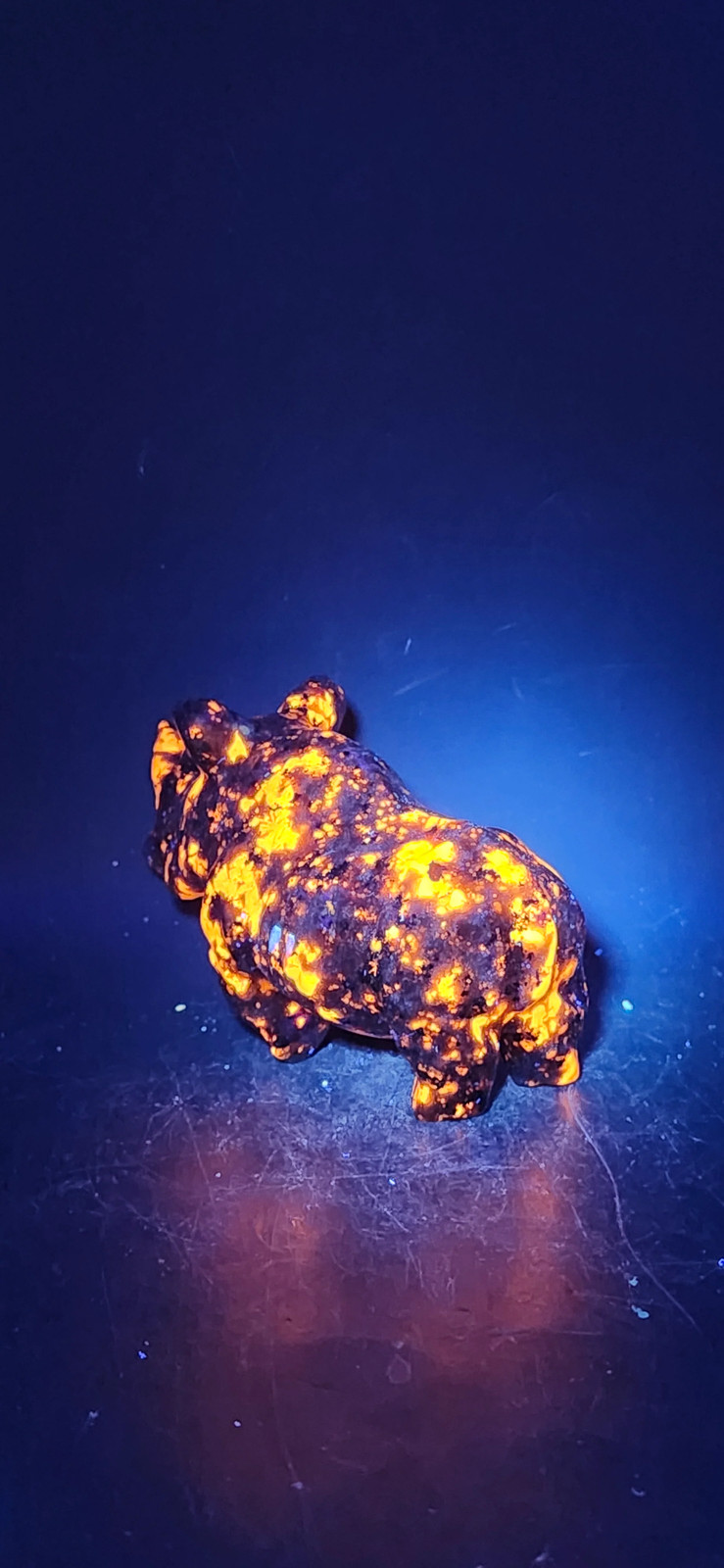 Flame stone “yooperlite” rhino! 8.5 ounces, 4 inches long, 2 tall