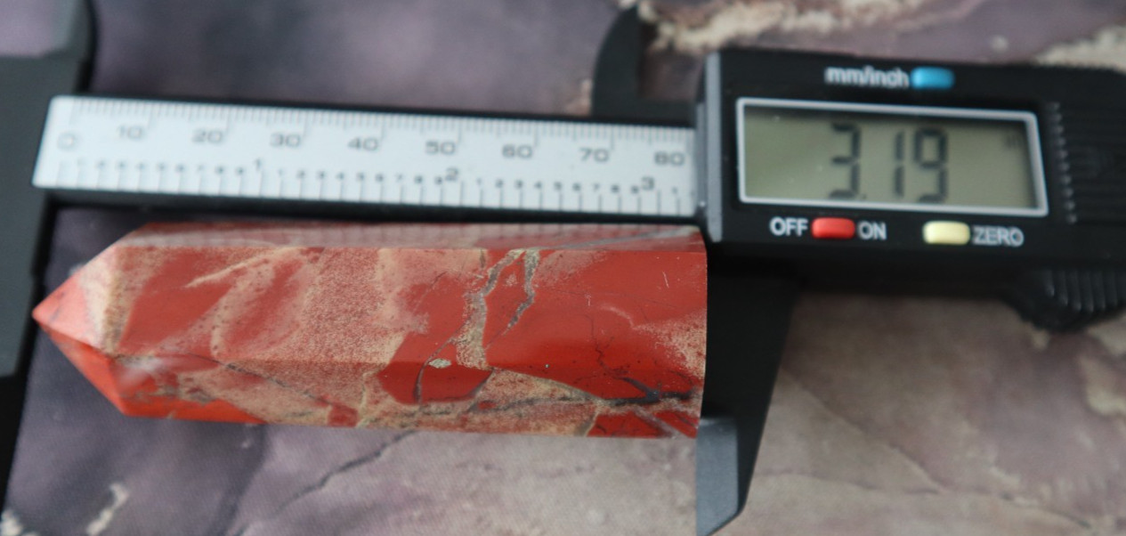 BRECCIATED JASPER POINT 3.19 INCHES TALL/ 88.5 GRAMS