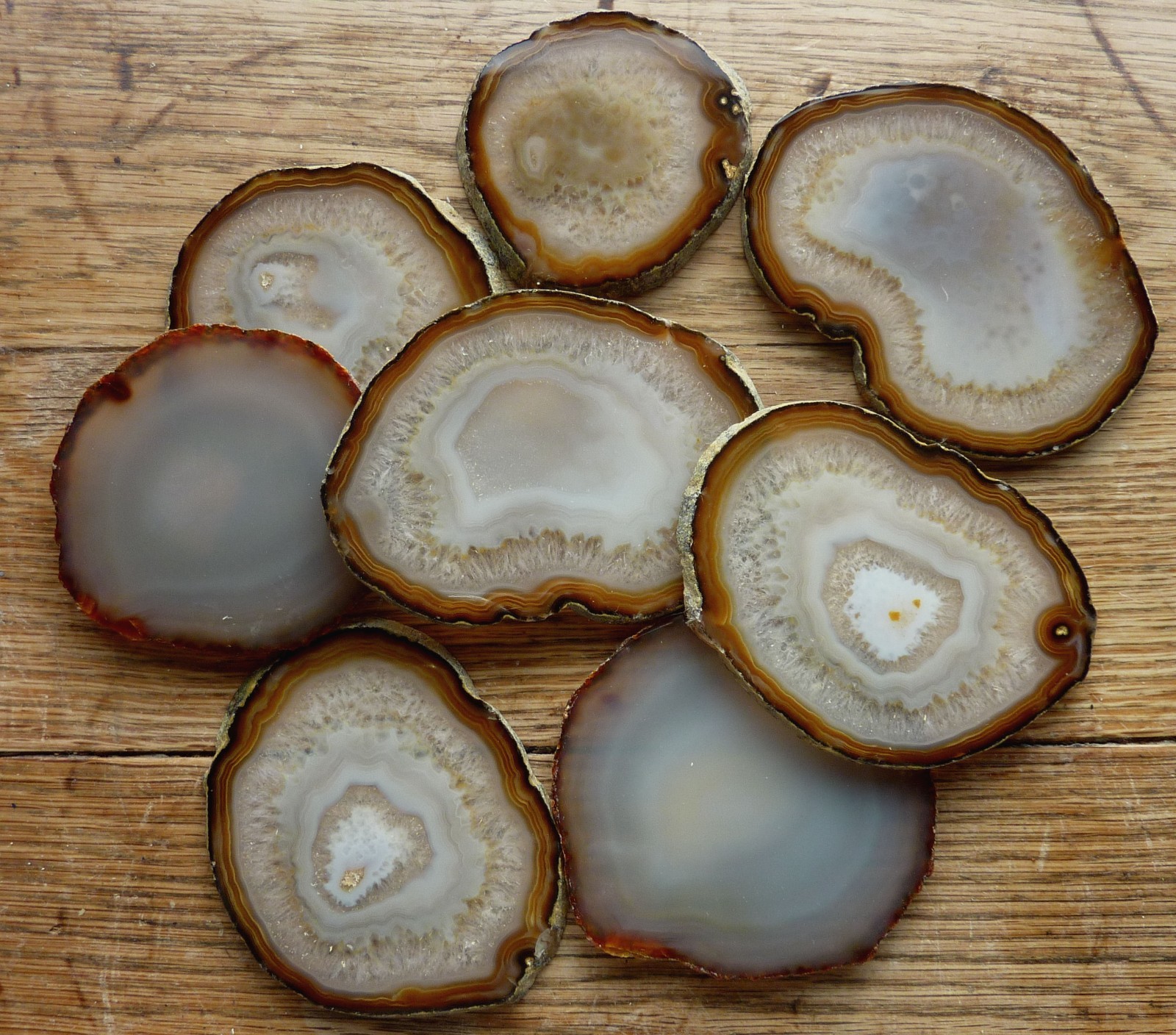 A set of Eight polished agate coasters, cut from single stone ex Brazil