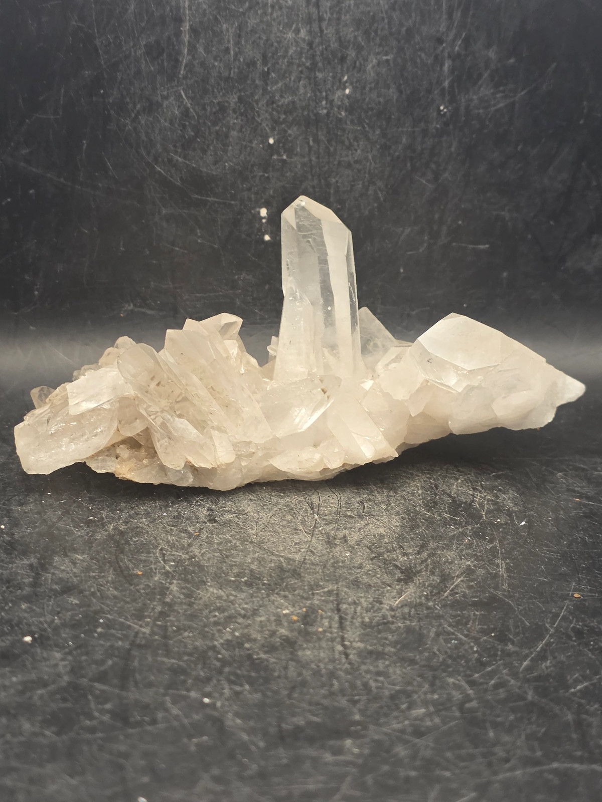 Clear quartz cluster! 7.7 ounces, 4.8 inches long, 2.5″ wide