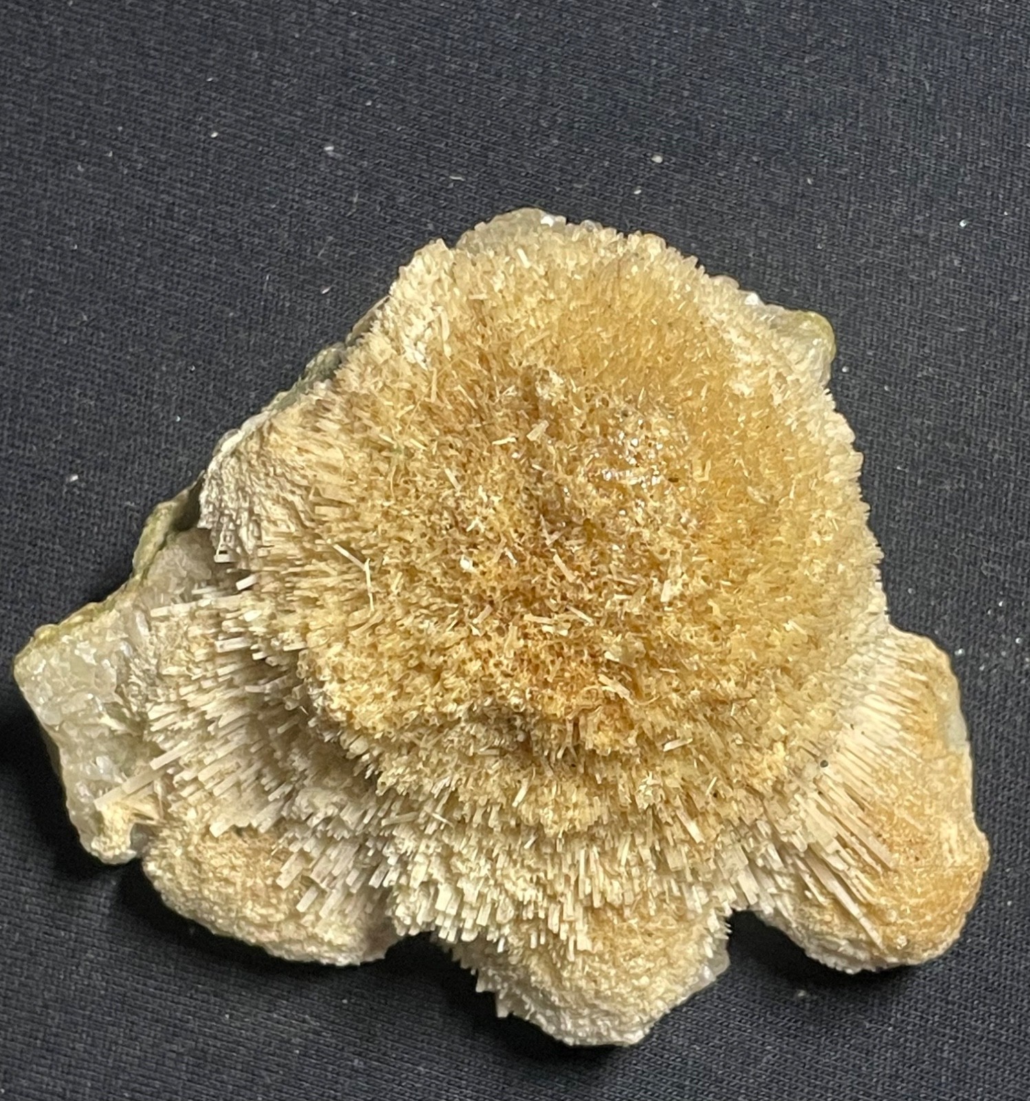 142g Natural thomsonite ball in yellow colour 7.5x8x3.5CM