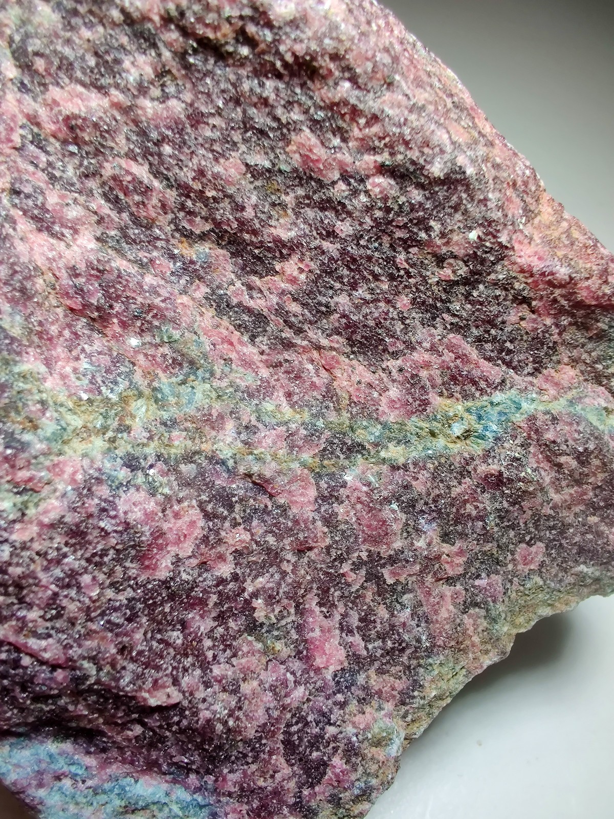 Ruby with large Kyanite crystals, UV. Mysore, Kamataka, India. 720 grams.