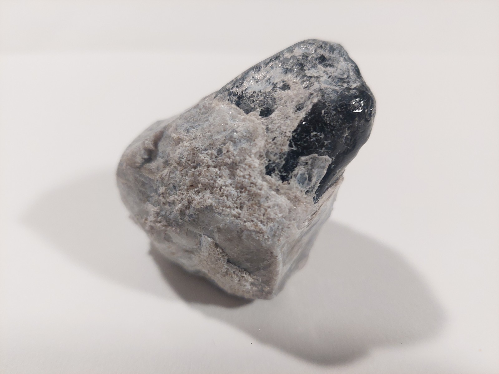 Large Apache Tear Obsidian encased in a 131g natural matrix of pearlite