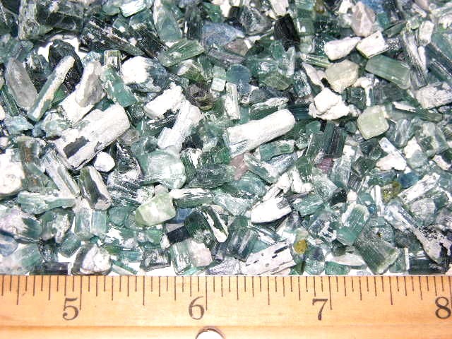 Tourmaline crystal blue green all natural with matrix 100 carat lots