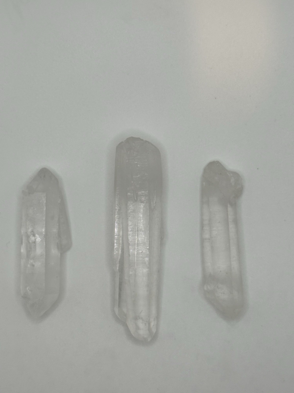 FOUR QUARTZ MINERAL CRYSTAL POINTS