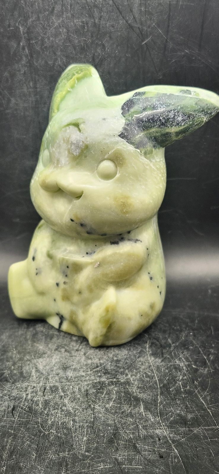 Serpentine Pikachu! 1.6 pounds, 4.5 inches tall, 2.7 inches wide