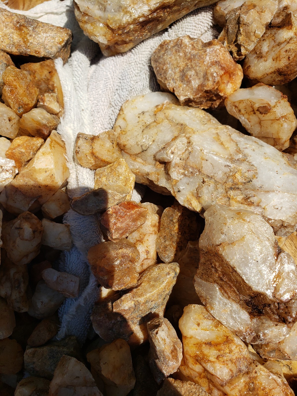 Assorted Raw Quartz crystals, Clear, Smokey, Strawberry, anywhere from 8*8″
