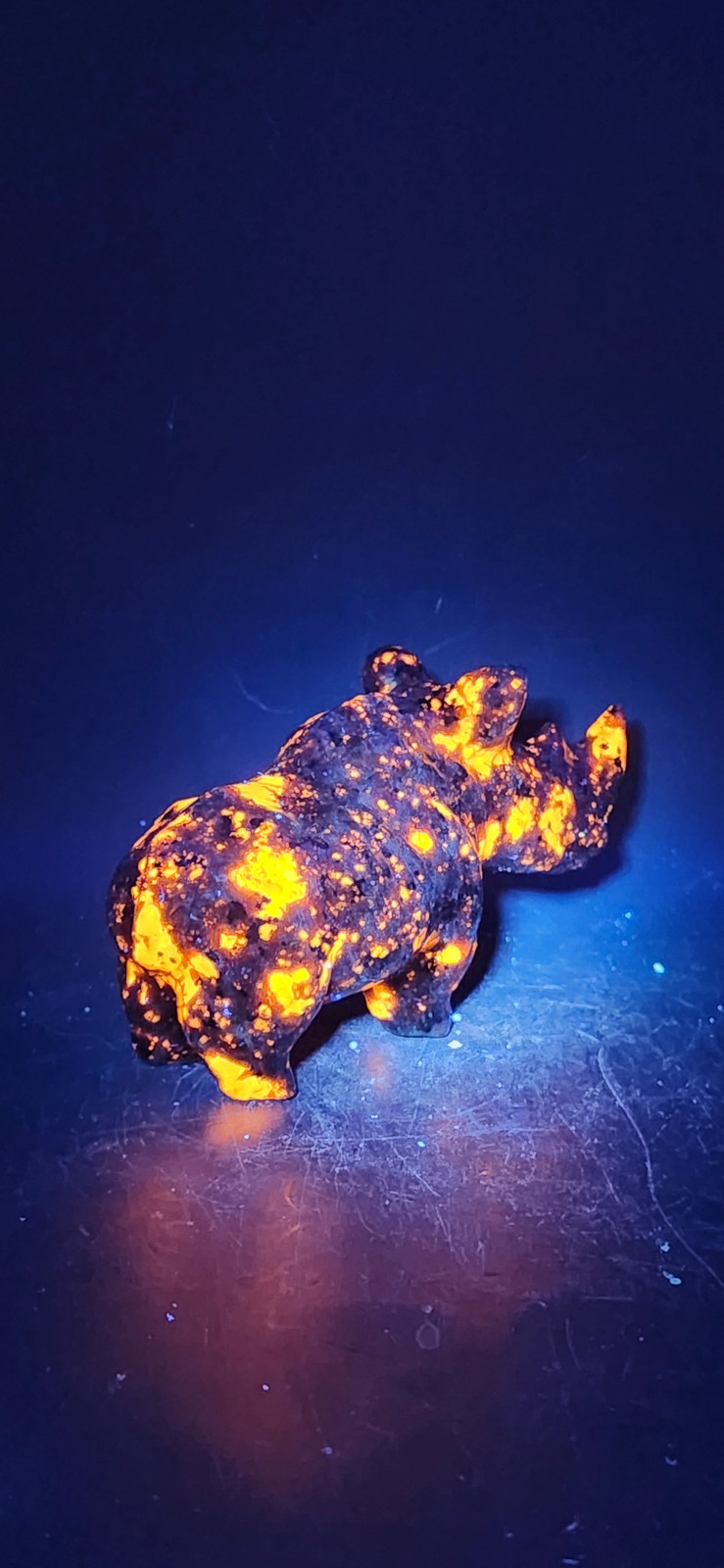Flame stone “yooperlite” rhino! 8.5 ounces, 4 inches long, 2 tall