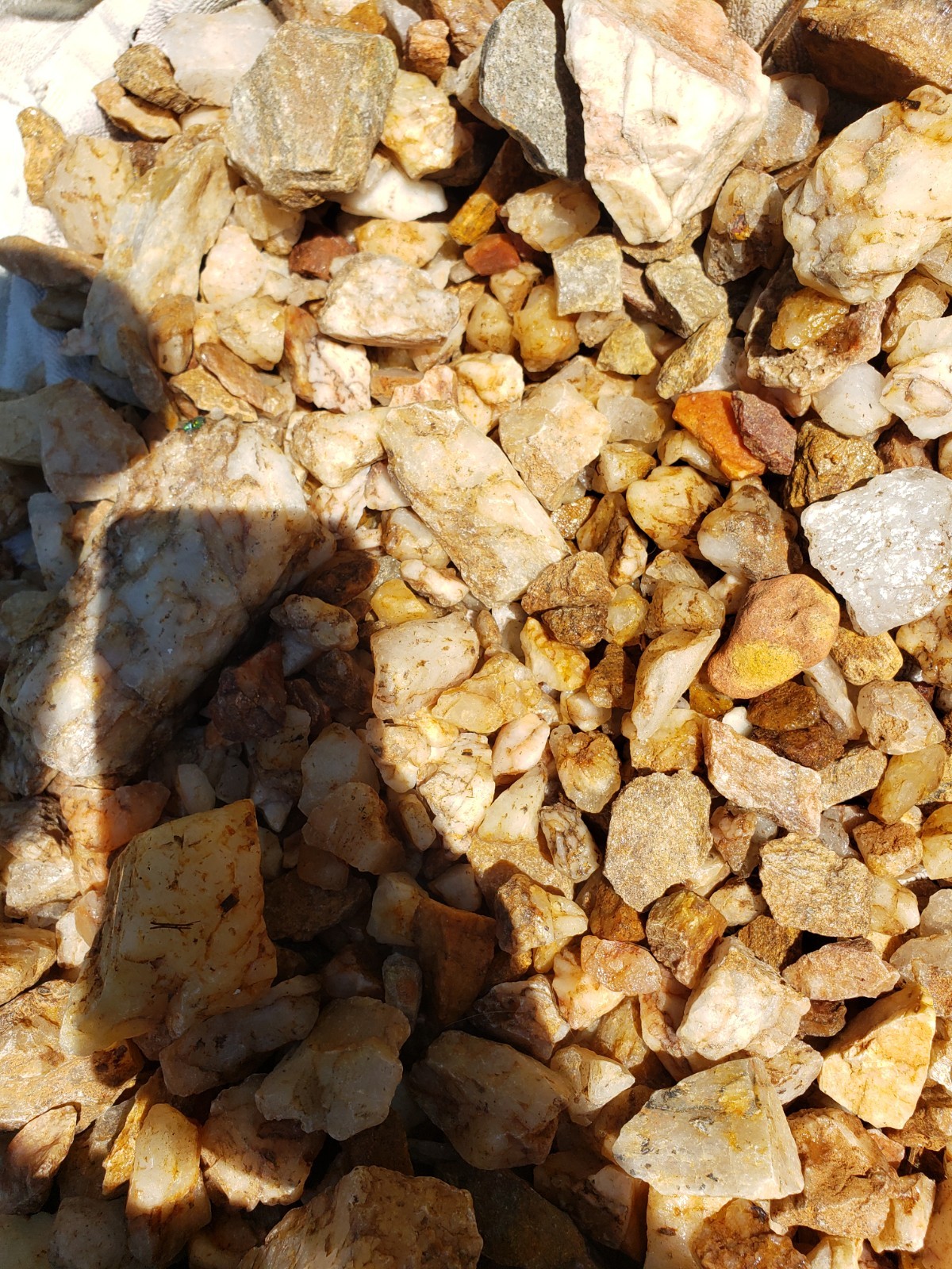 Assorted Raw Quartz crystals, Clear, Smokey, Strawberry, anywhere from 8*8″