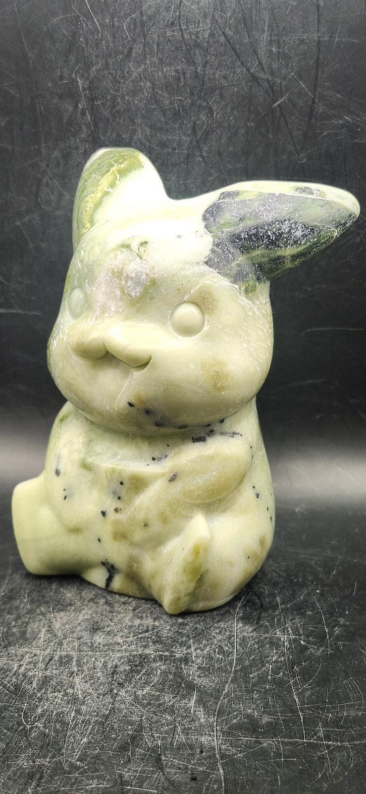 Serpentine Pikachu! 1.6 pounds, 4.5 inches tall, 2.7 inches wide