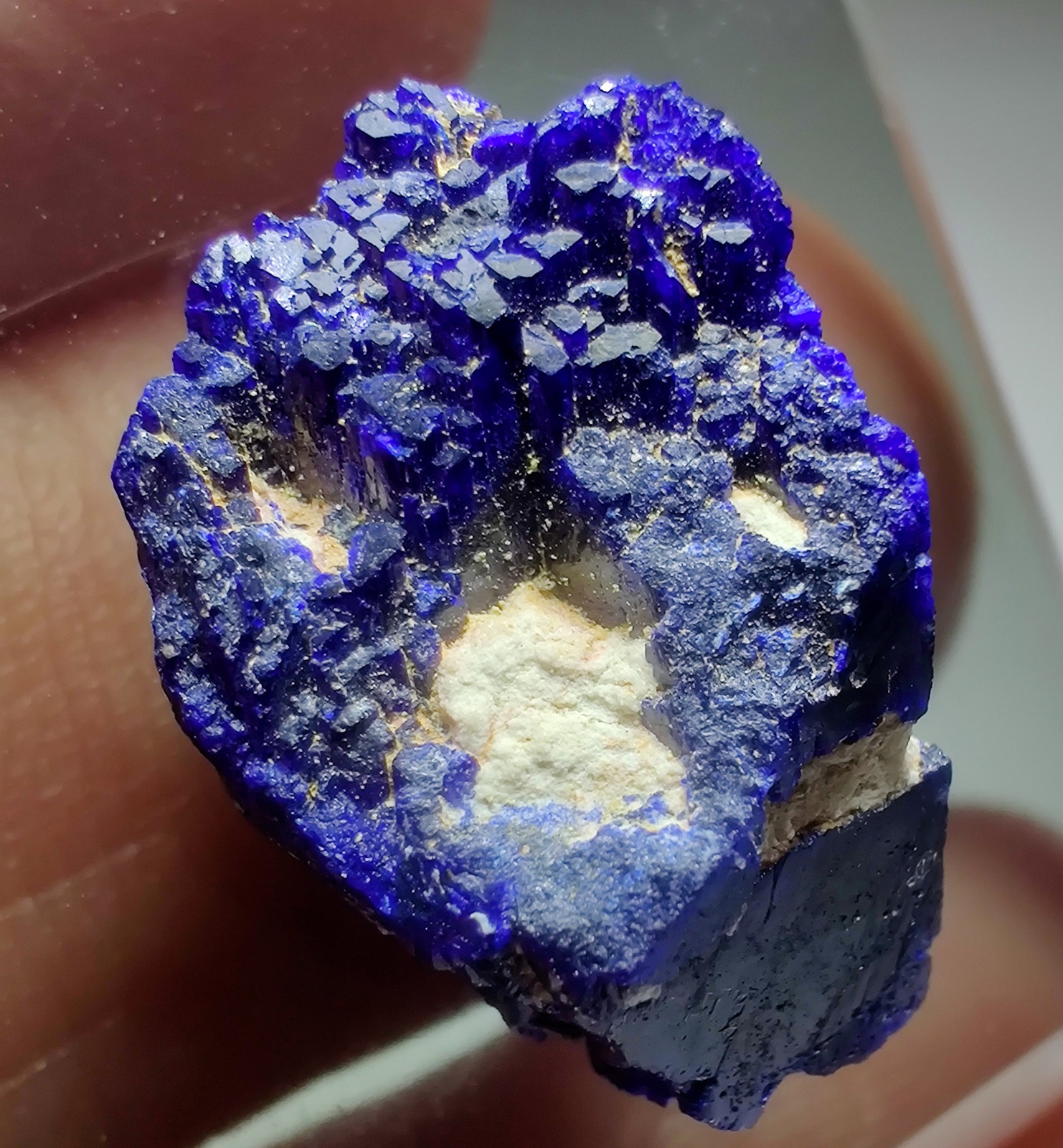 Azurite crystal, electric blue, sharp. Kerrouchen, Morocco. 2 cm.