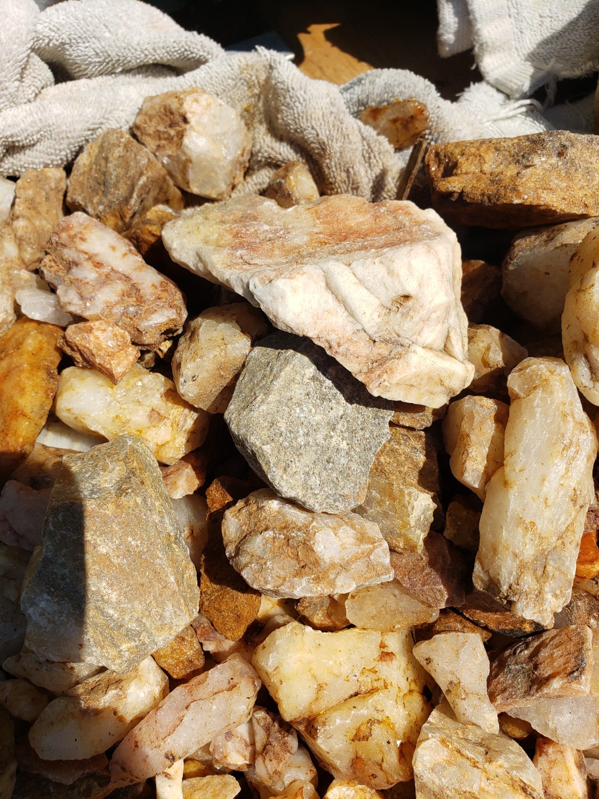 Assorted Raw Quartz crystals, Clear, Smokey, Strawberry, anywhere from 8*8″