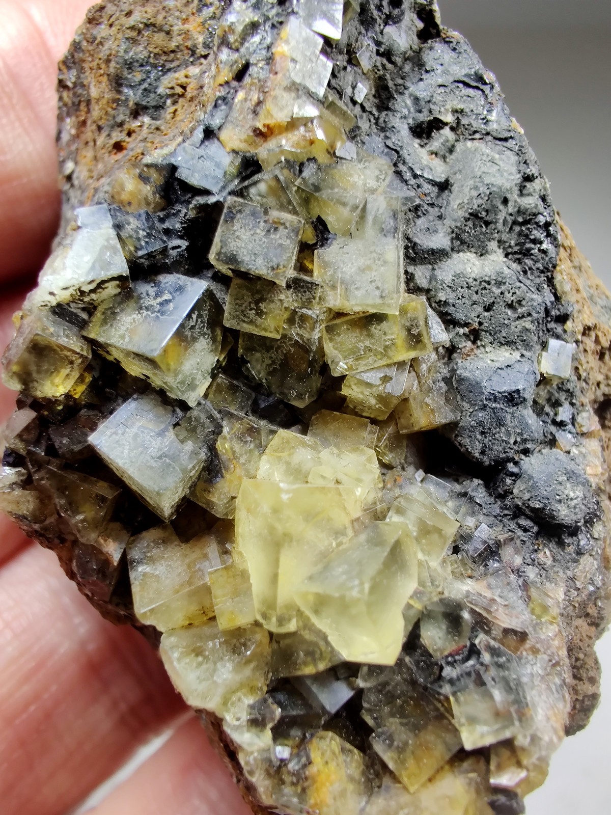 Fluorite crystals with Tar smell!. Illinois-Kentucky Fluorspar Dist. 118 grams.