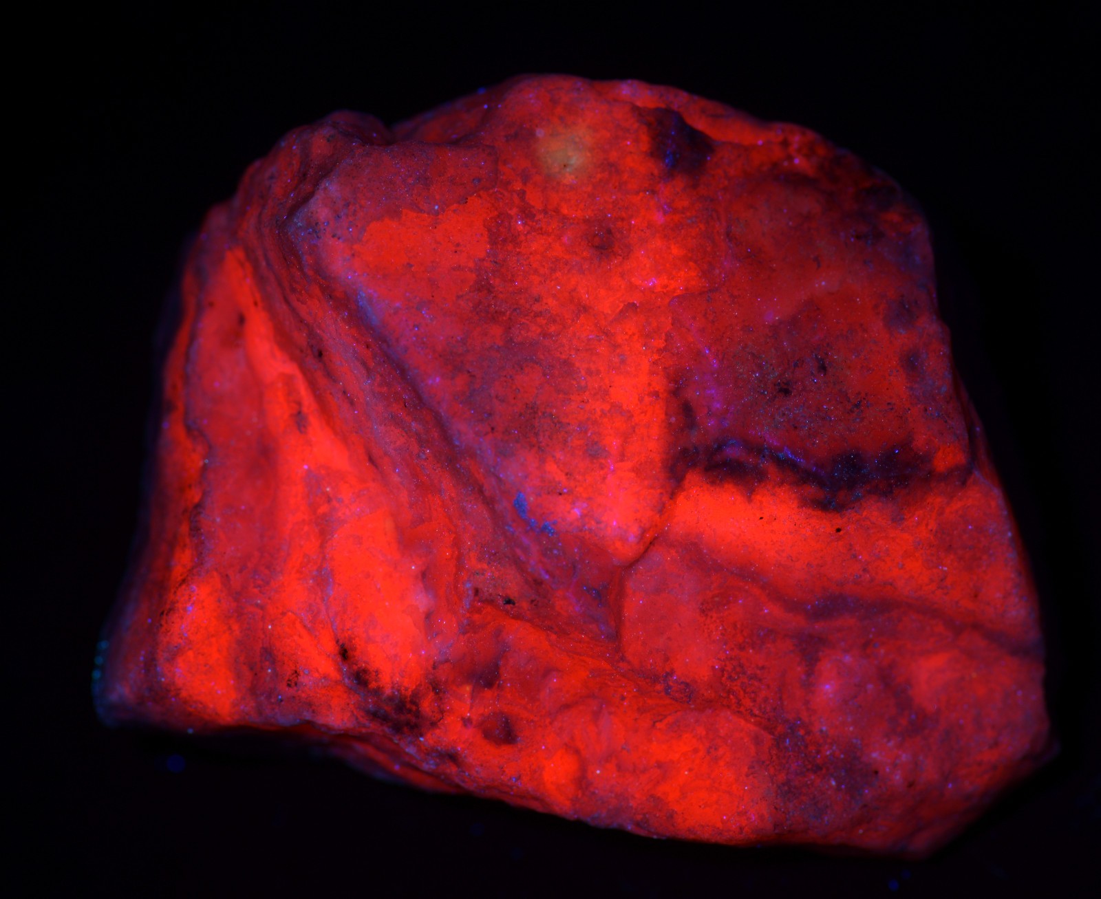 Mangano Calcite, bright fluorescence. Ancash, Peru. 133 grams.