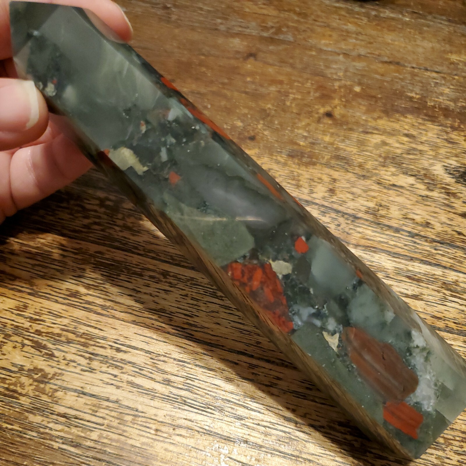 African Bloodstone Crystal Tower Point. Approx 6.75in x 1.46in x 1.11in, 304g