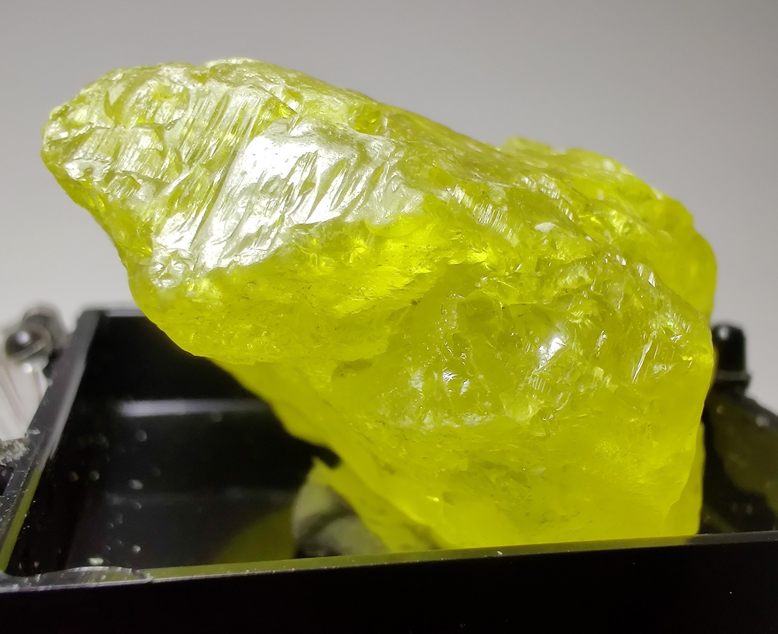 Sulfur crystal with wonderful color. Maybee Quarry, Michigan. 4 cm.
