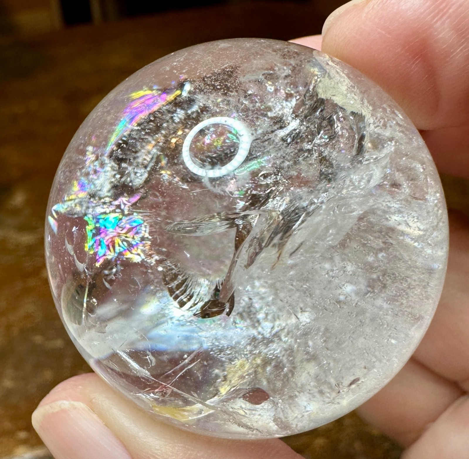 Clear quartz crystal sphere many rainbows with metal bunny stand Free shipping