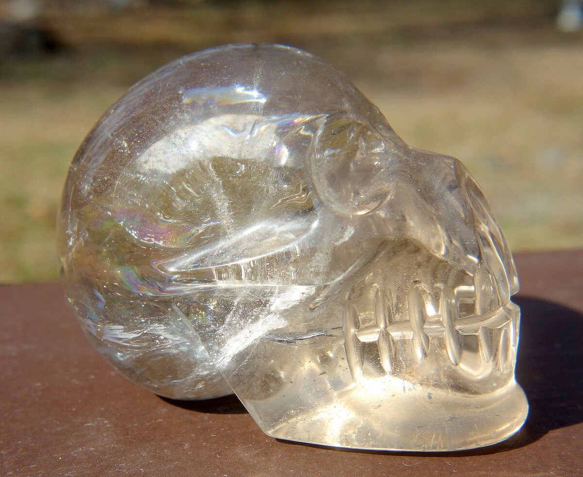 Quartz Crystal Skull Carving with Rainbows and a Touch of Smoky