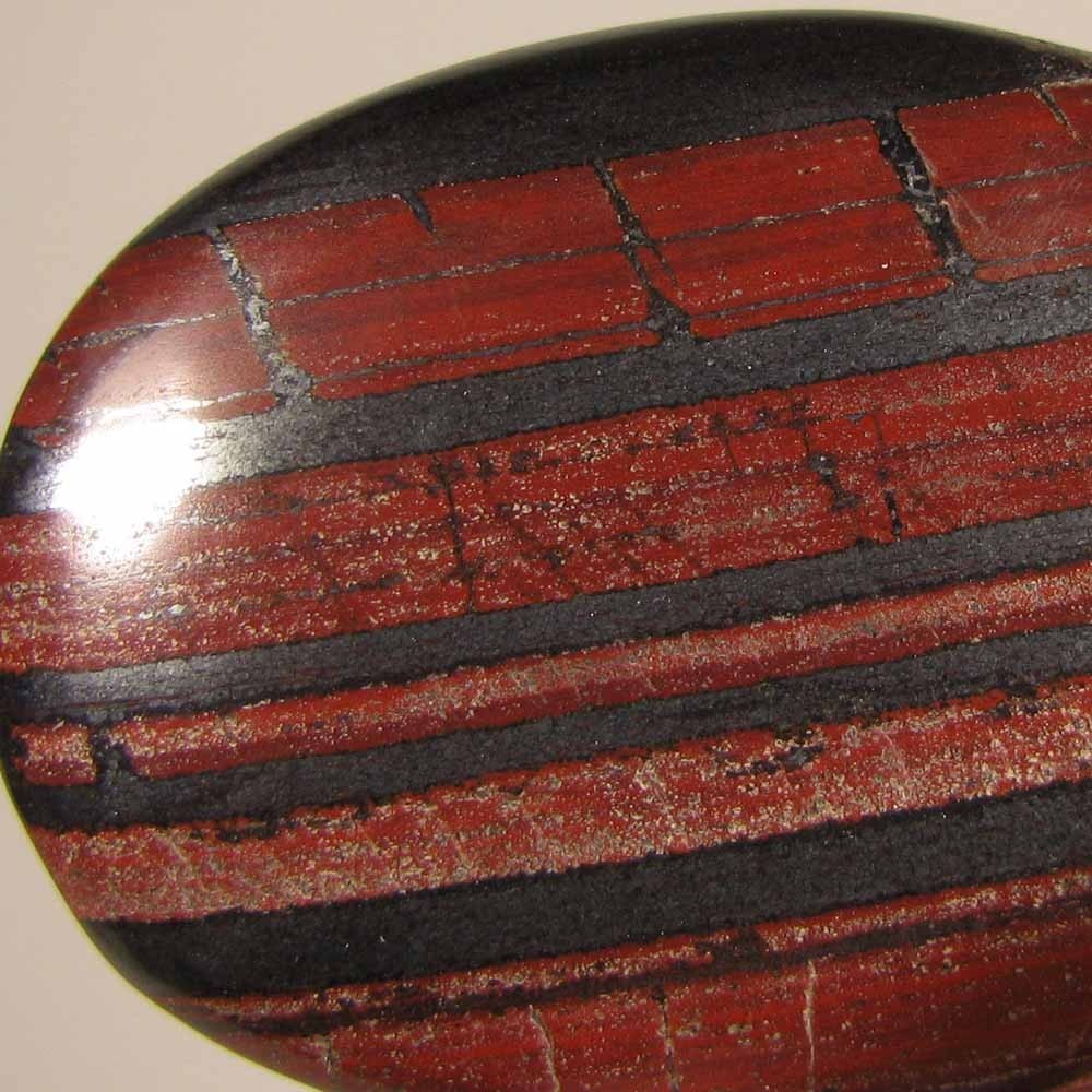 2.1″ Banded RED IRON JASPER Polished Palm Stone – India