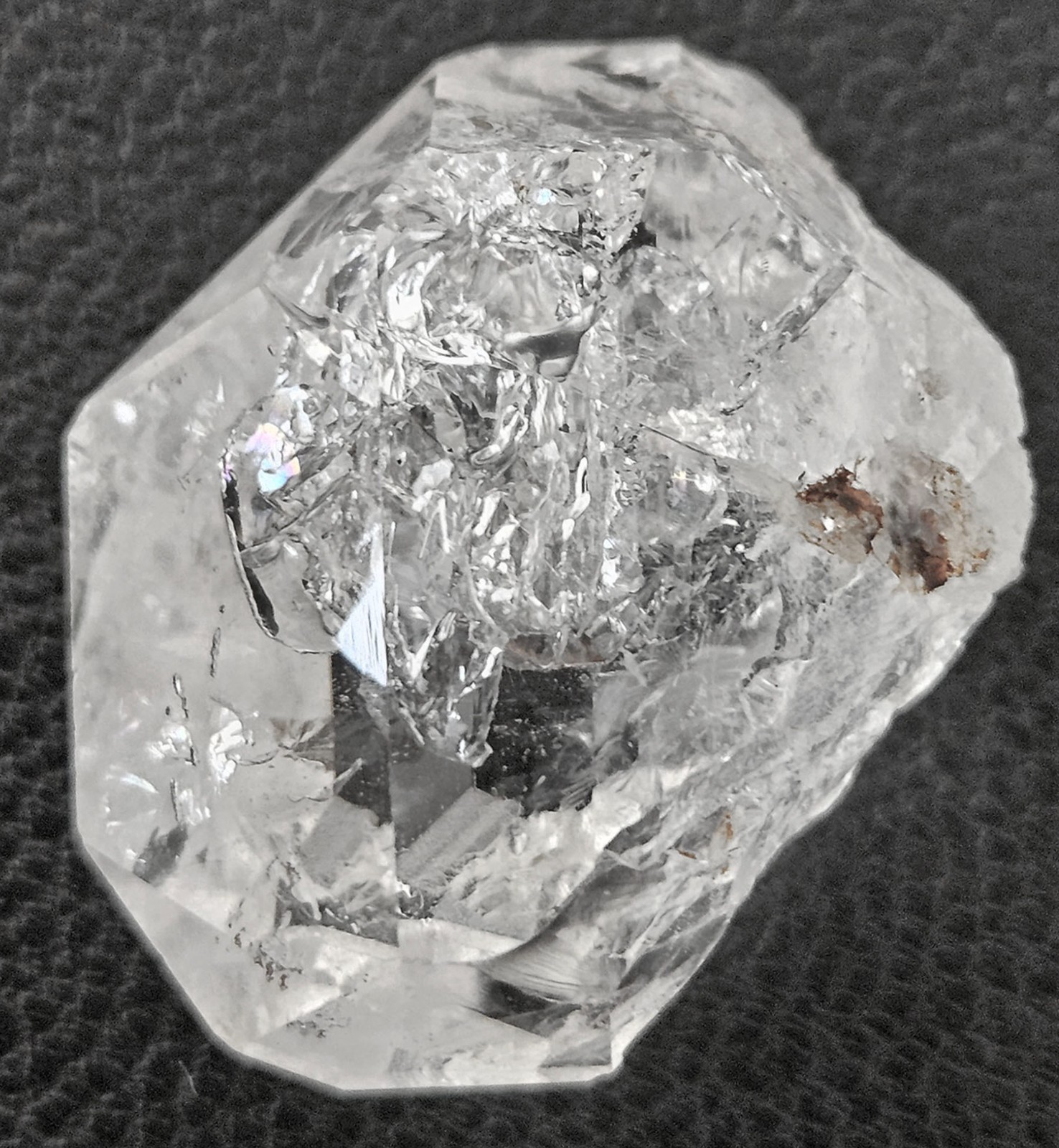 Gorgeous 3 cm Quartz var Herkimer Diamond with 10 facets, Rainbows and Voids