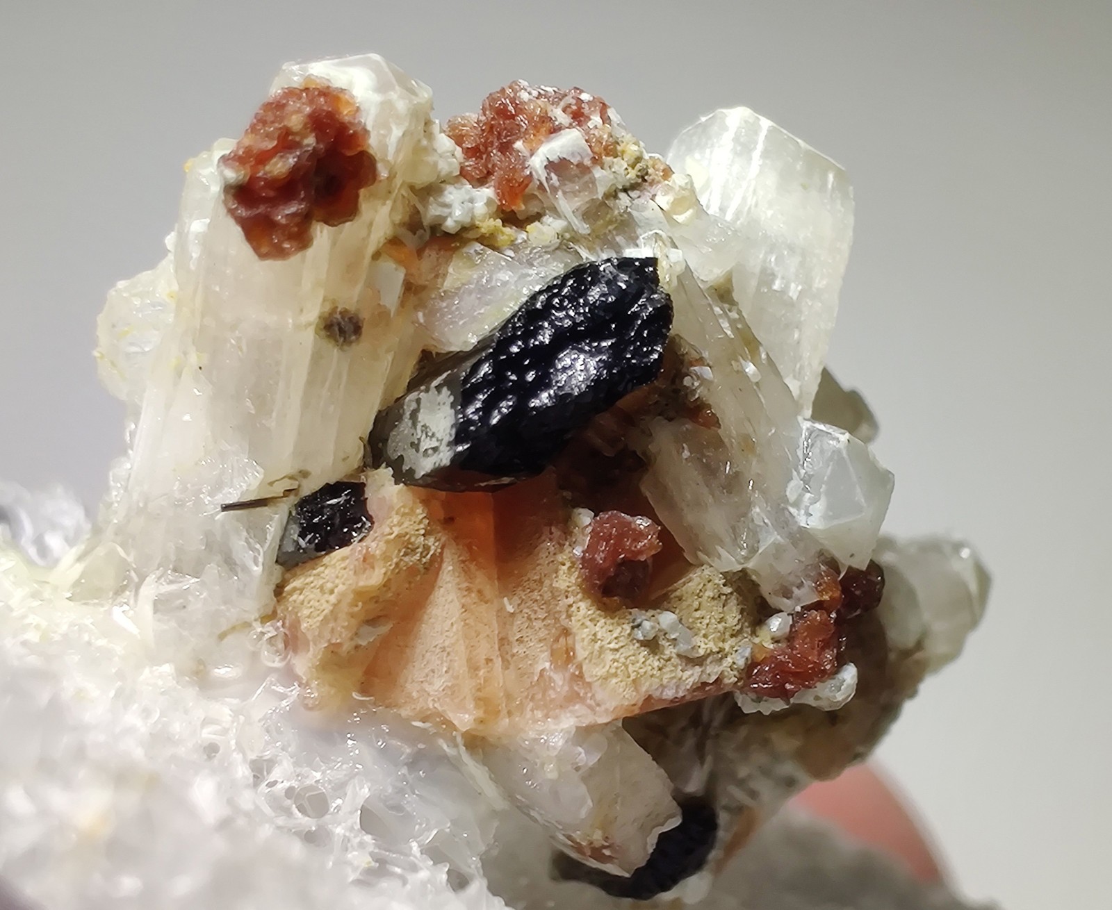 Rhodochrosite, Serandite, Natrolite crystals. Mt. St. Hilaire, Canada. 2.2 cm.