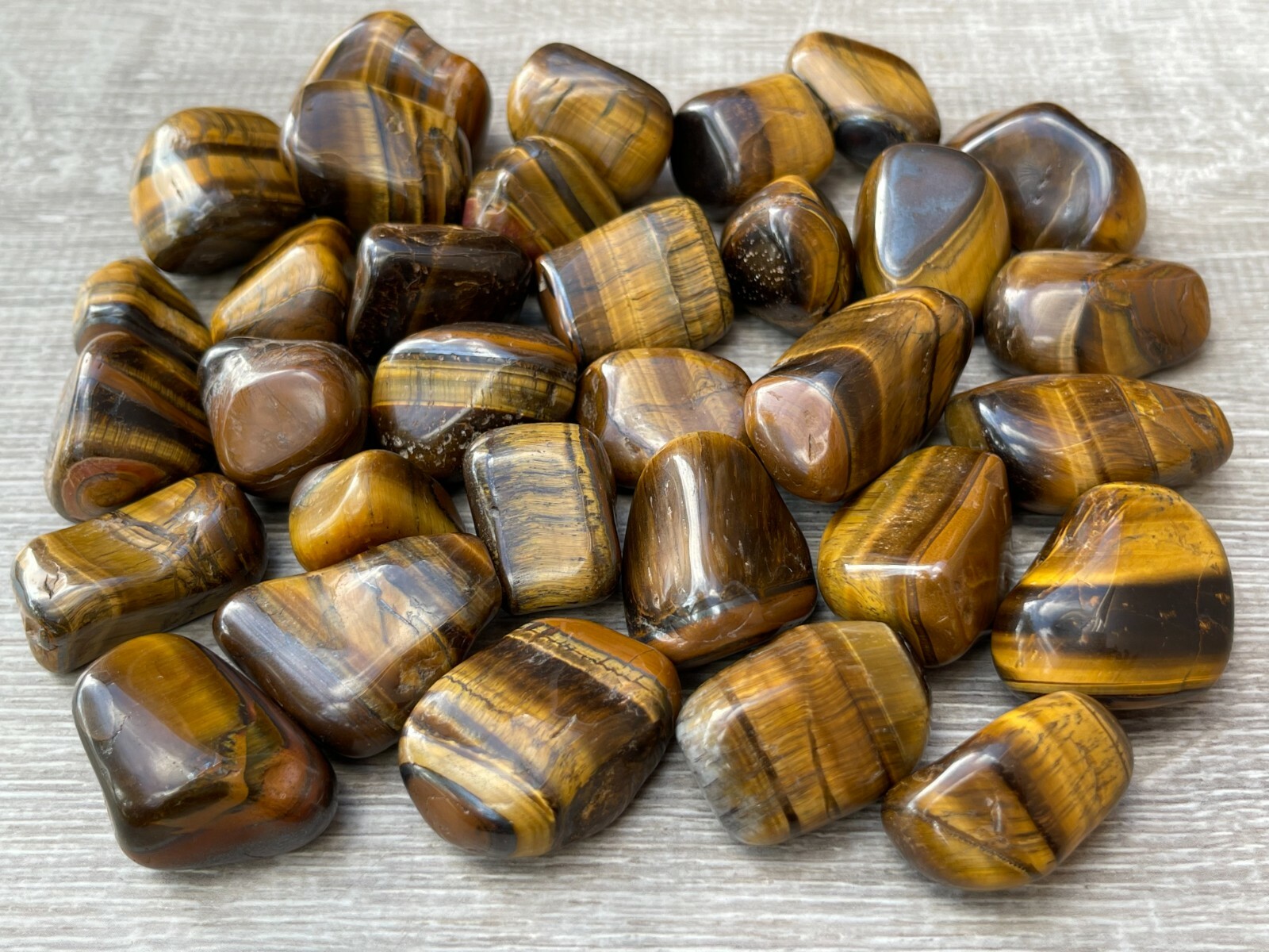 Grade A++ Gold Tiger Eye Tumbled Stones, 0.85″-1.5″ Tumbled Tiger Eye, Bulk Lot