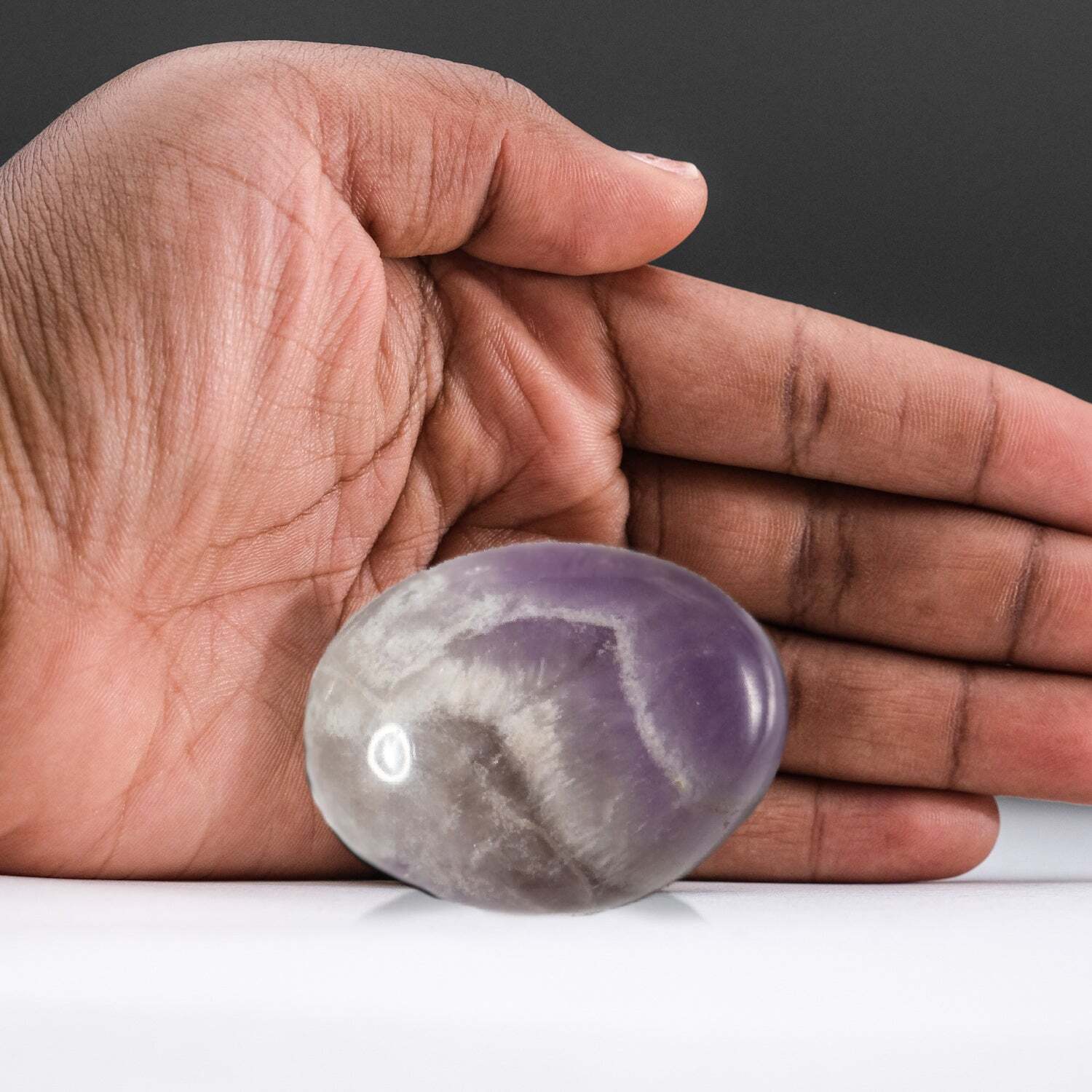 Genuine Polished Chevron Amethyst Palm Stone