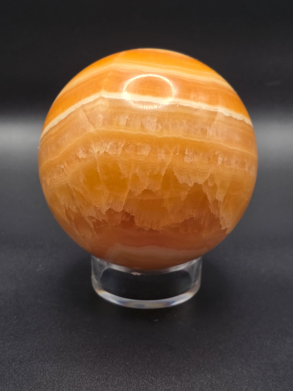 Large orange calcite sphere! 82.6mm, 3.2 inches, 1.12 pounds