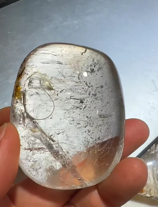 63*49*27mm Natural Enhydro Quartz Moving Water Drop Specimens Palm Reiki